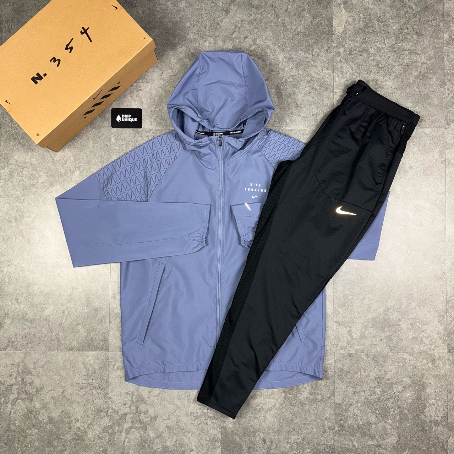 Nike Running Division Windrunner Jacket Light Blue