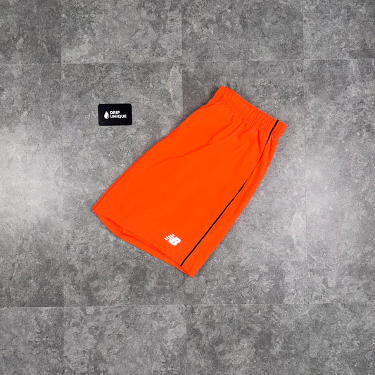 New Balance Core Run Shorts 7” Orange