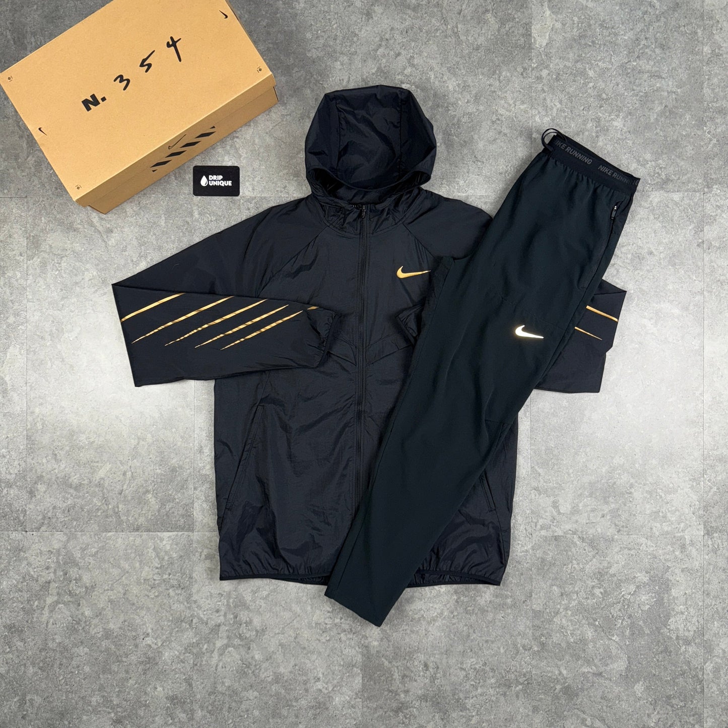 Nike UV Windrunner Jacket Black & Gold